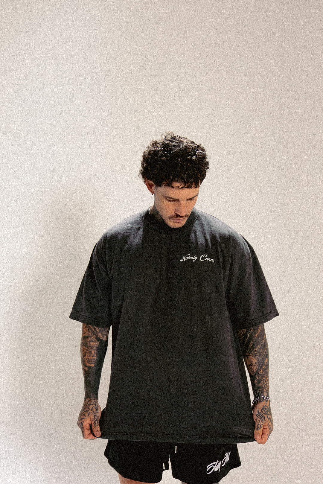 NOBODY CARES ARCH TEE VINTAGE CHARCOAL
